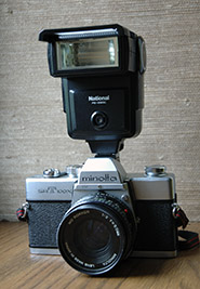 minolta SRT100X parfait etat de fonctionememt cellule ok
