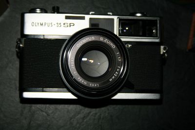 Olympus 35 SP
neuf,mais un peu bossé au niveau du porte filtre.
