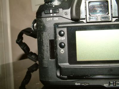 Dynax 7
Dos abîmé
